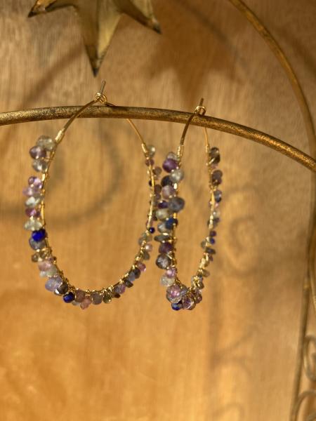 Gorgeous gemstone earrings in purple and blue tones.