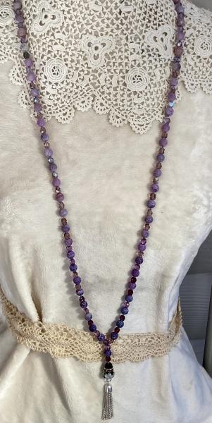 Long hand knotted necklace with purple frosted agate and crystal picture