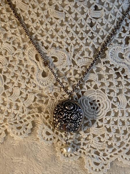 Silver bell necklace from up cycled tableware picture