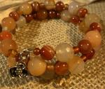 Agate and carnelian.925 silver coil bracelet