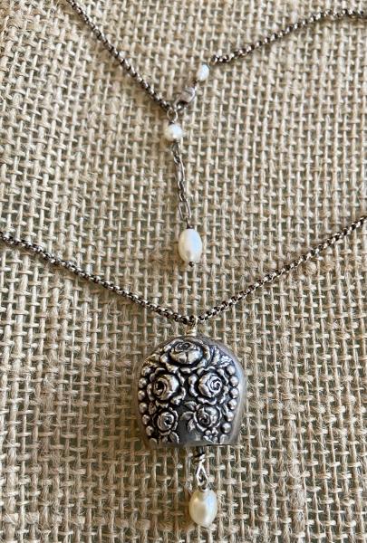 Silver bell necklace from up cycled tableware picture