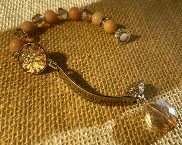 Sentiment bracelet with peach calcite and crystal. picture