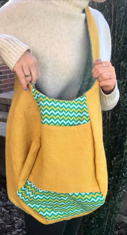 Turquoise Reversible Sling Bag picture