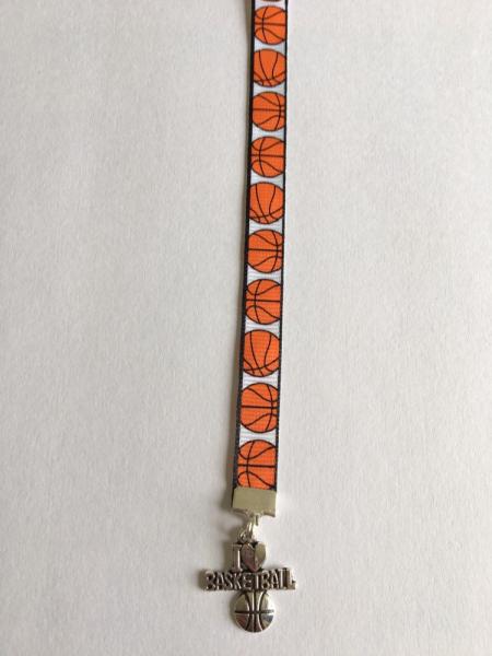 Basketball bookmark with clip - Attach clip to book cover then mark the page with the ribbon. Never lose your bookmark! picture