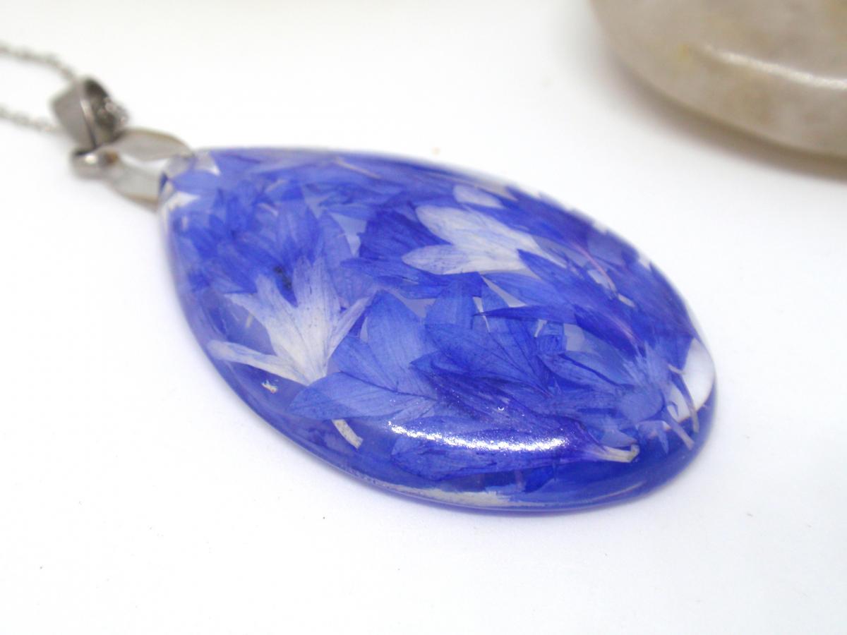 Blue Cornflower petals in teardrop resin necklace picture