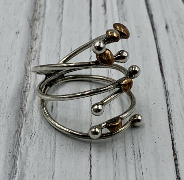 Three prong silver and brass adjustable ring