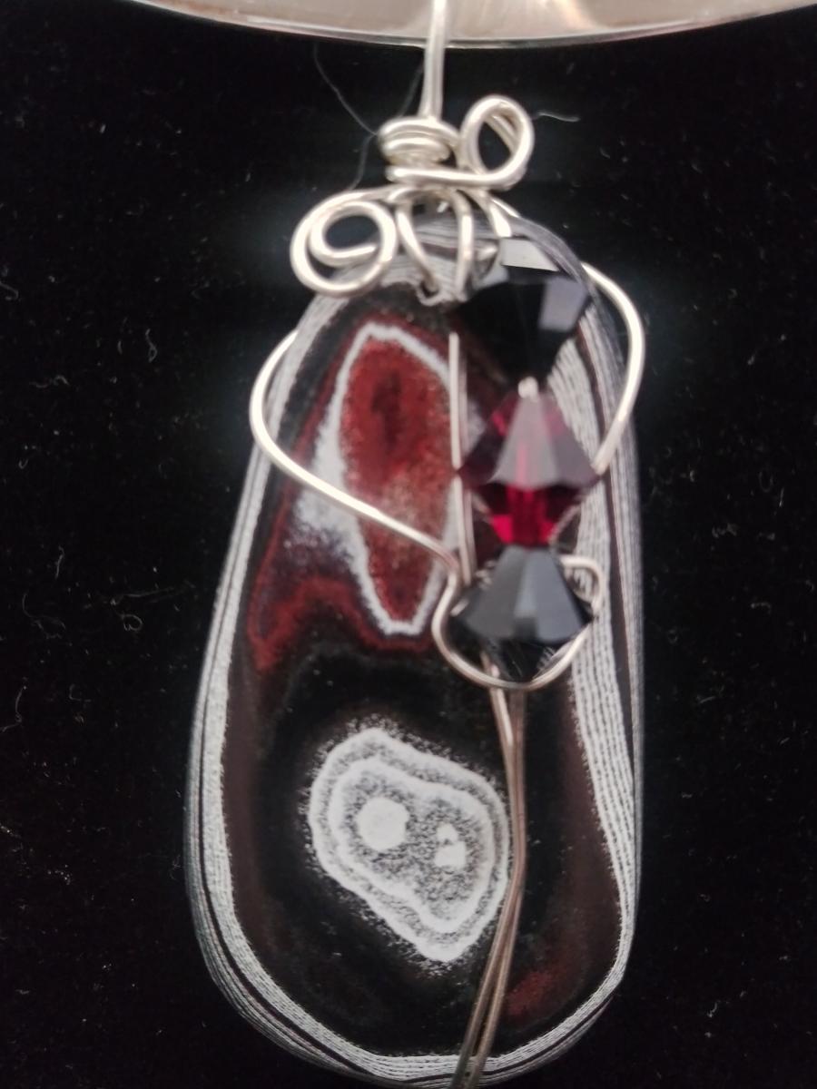 Unique Fordite pendant only picture