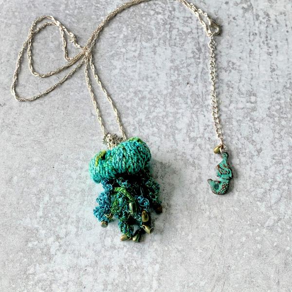 Jellyfish Pendant Necklace - Multimedia - Fiber, Metal, Glass Beads - Blue, Green, Turquoise - Crochet - Adjustable Length - One of a Kind picture