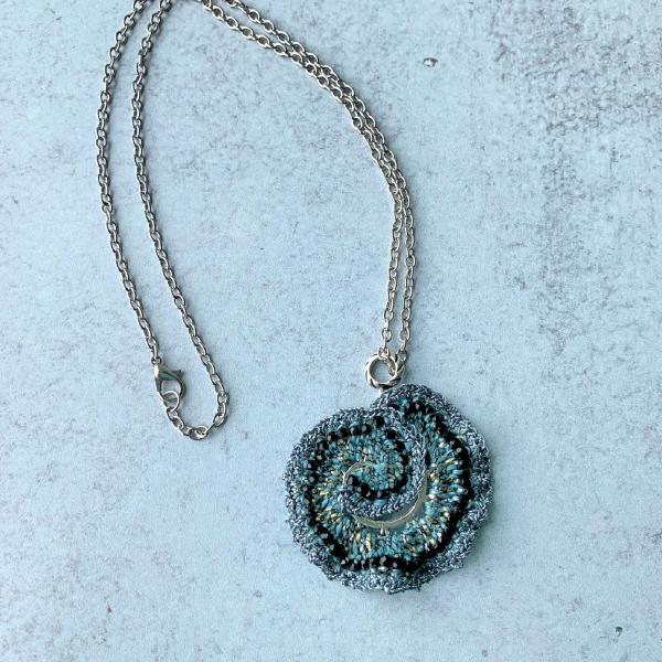 Curly Girl Spiral Swirl Pendant Necklace - Mixed Media - Metal Fiber Glass - Pale Sage Green, Silver, Black, Metallics - Crochet - OOAK picture