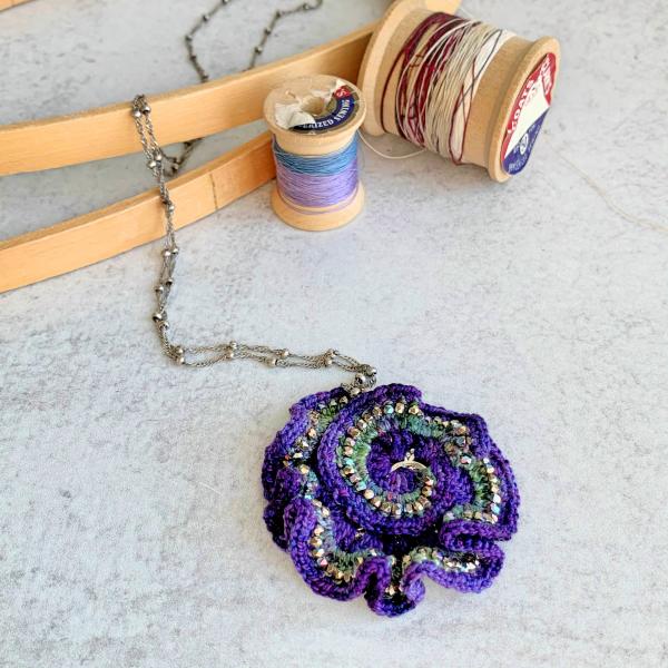 Curly Girl Spiral Swirl Pendant Necklace - Mixed Media - Metal Fiber Glass - Purple, Green, Silver, Iridescent Metallic Beads - Crochet - OOAK picture