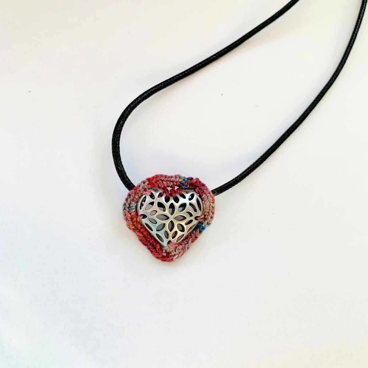 Slider Heart Pendant Necklace - Mixed Media - Antique Silver Filigree Metal Heart - Pink Red Multicolor Fiber - Black Waxed Cotton Cord - 23 inch picture