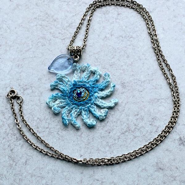 Sky Blue Mixed Media Flower Pendant - Crochet Linen Petals - Hand Painted - Embroidered Center - Glass Leaf - 24 inch Chain - One of a Kind picture