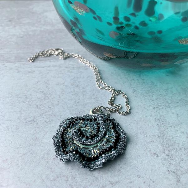 Curly Girl Spiral Swirl Pendant Necklace - Mixed Media - Metal Fiber Glass - Pale Sage Green, Silver, Black, Metallics - Crochet - OOAK picture