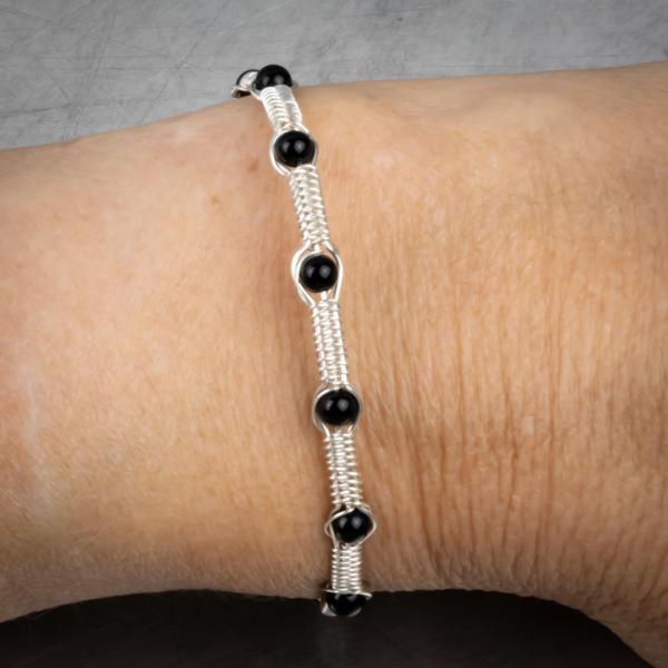 Silver snake weave bracelets picture