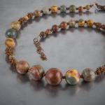 Red creek jasper graduated necklace with woven spiral copper beads