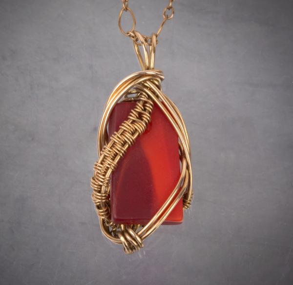 red tumbled glass bronze woven pendant