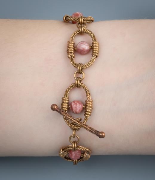 Rhodochrosite bronze braided oval bracelet picture