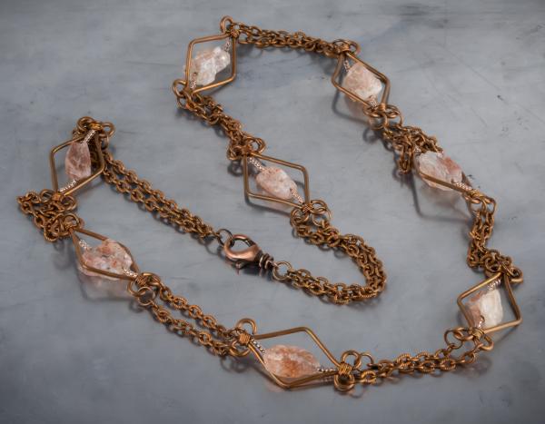 Sunstone and copper wire work necklace