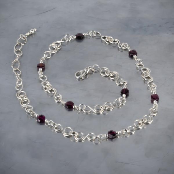 Garnet and sterling silver "S" link necklace