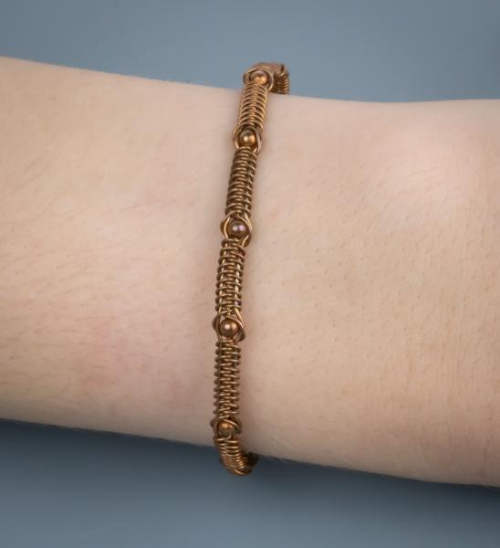 Copper and copper/silver snake weave bracelet picture