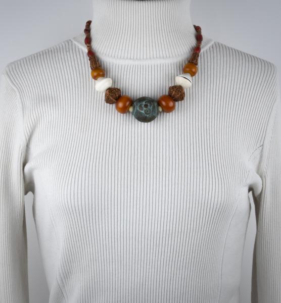 Nigerian bronze, phenolic resin, mauritaian shell, red heart and copper woven bead necklace picture