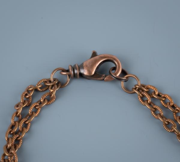 Sunstone and copper wire work necklace picture