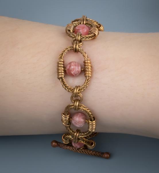 Rhodochrosite bronze braided oval bracelet picture