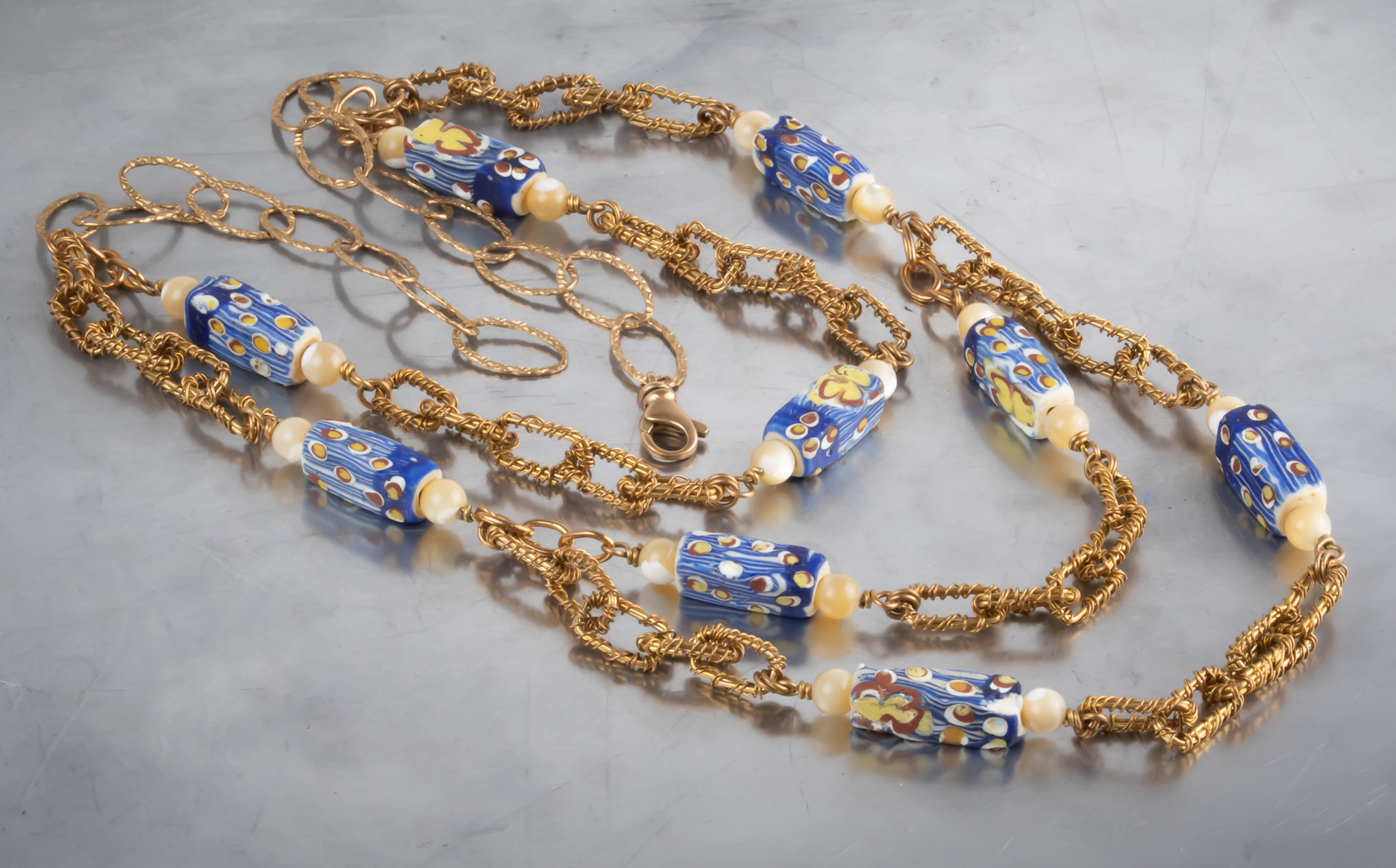 Venetian lamp work, mother of pearl, bronze wire work link triple strand necklace picture