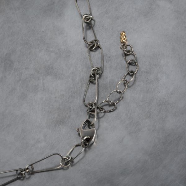 Coral sterling silver pendant on woven chain picture