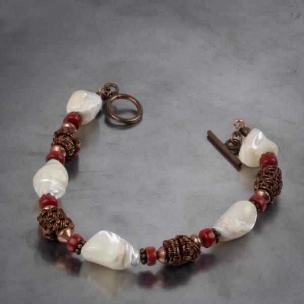 Mother of pearl, red coral, copper woven bracelet picture