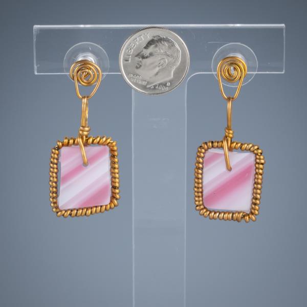 Tumbled glass earrings with metal surround picture