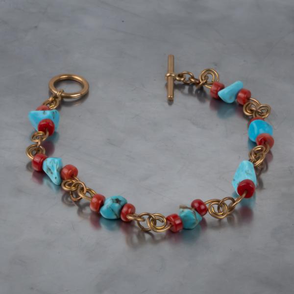 Turquoise, red coral, bronze wire work bracelet