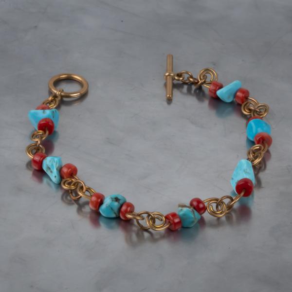 Turquoise, red coral, bronze wire work bracelet picture