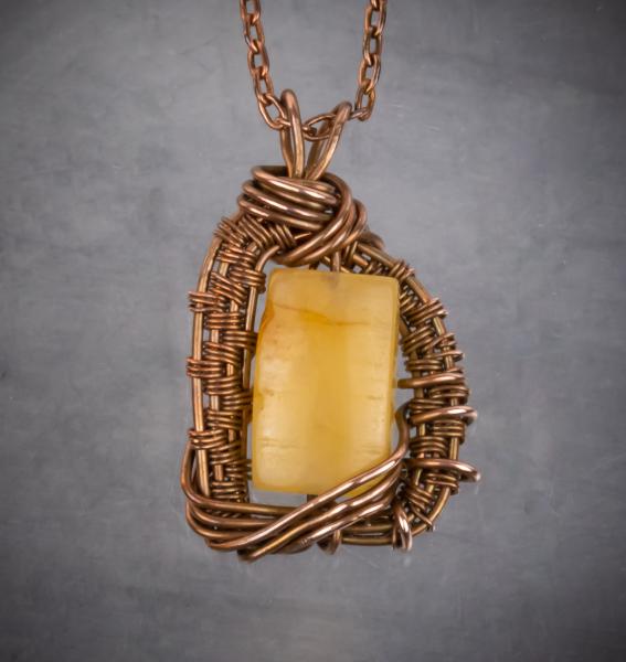 Yellow Jade and copper wire woven pendant picture