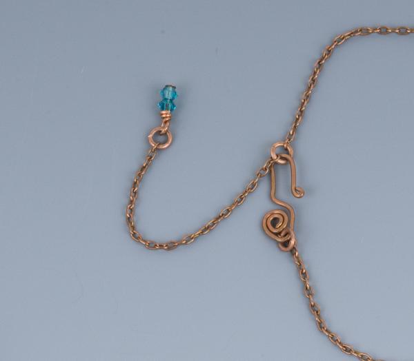 Caribbean blue & orange tumbled glass copper woven pendant picture