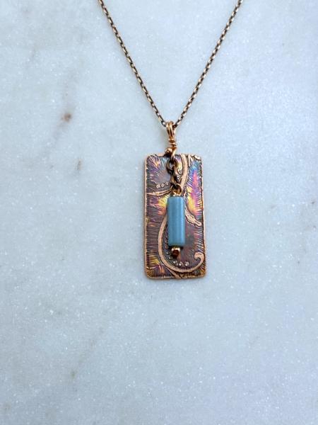 Acid etched copper swirl necklace with moss agate picture