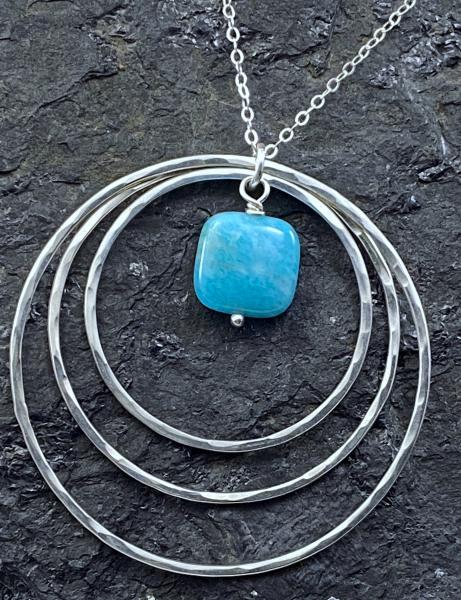 Sterling silver forged circle necklace with apatite gemstone picture