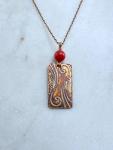 Acid etched copper swirl necklace with coral