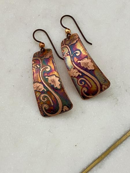 Acid etched copper swirl earrings with leaves