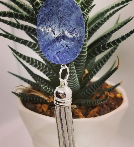 Blue oval stone necklace with gray tassel
