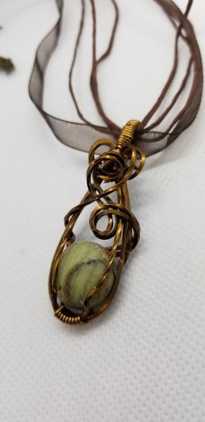 Elven wrapped green stone picture
