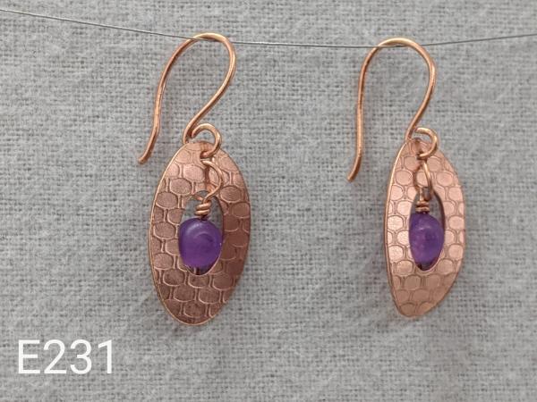 Textured copper earrings with Amethyst beads