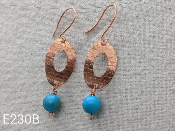Textured copper earrings with turquoise beads