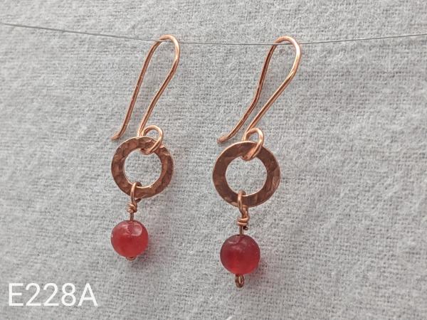 Textured copper earrings with red quartz beads