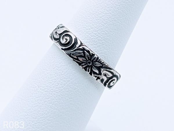 Sterling Silver floral swirl size 7