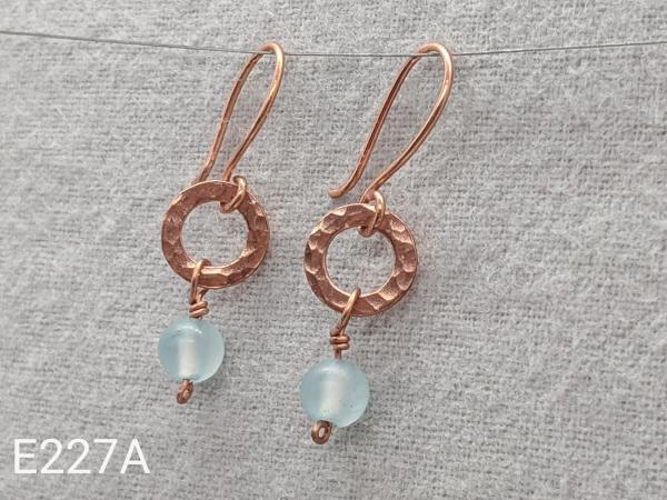 Textured copper earrings with icy jade beads