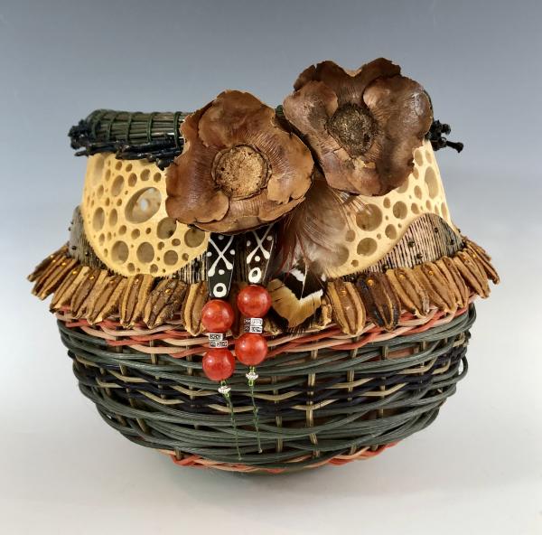 Modios Vessel with Pine Needles and Coco Flowers picture