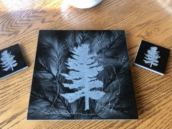 Etched White Pine within Michigan outline on granite lazy Susan hot plate picture