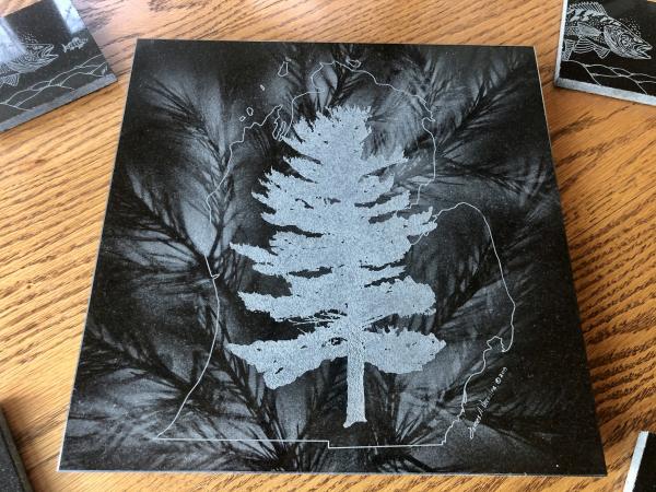 Etched White Pine within Michigan outline on granite lazy Susan hot plate picture