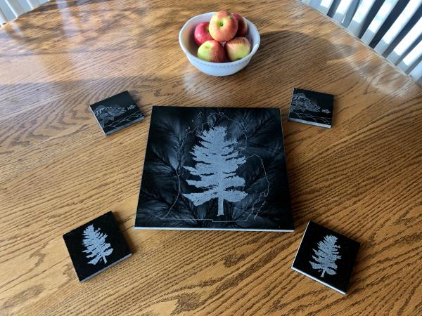 Etched White Pine within Michigan outline on granite lazy Susan hot plate picture